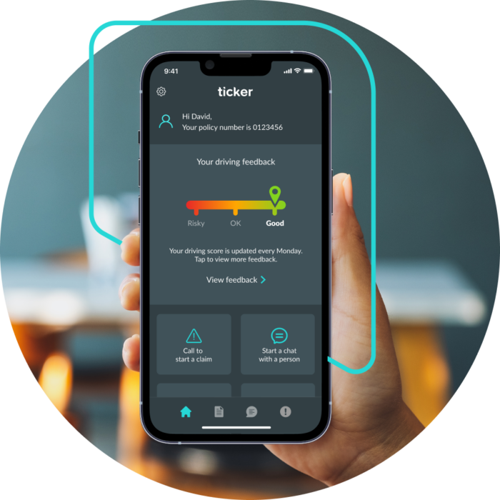 A hand holding the Ticker older driver app